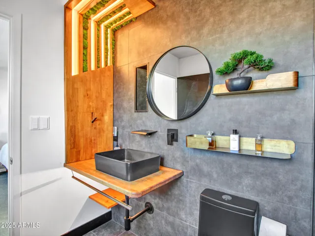 Slide mirror to side to expose storage