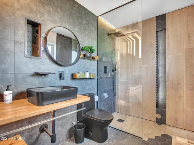 Mirror slides over to expose storage area
