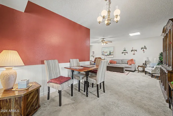 The "L" Shaped Living/Dining area has newer flooring in 2020