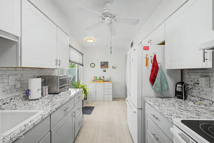 The 3 door GE Refrigerator is included too! Laminate Flooring in all "wet" areas installed in 2020.