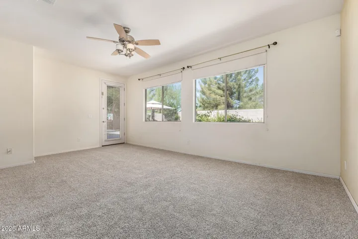 Master bedroom w/ door to back yard
