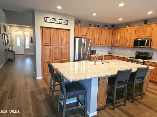 Kitchen with view of front entry door