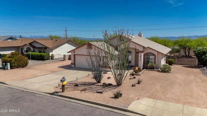 2nd Driveway apron to back yard on right side of home