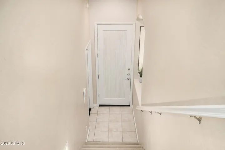 interior stairs from garage and front door