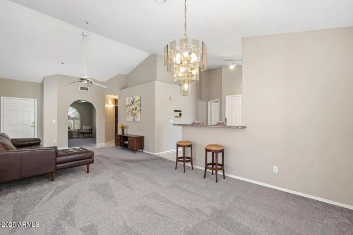 Open concept w/ kitchen view, vaulted ceilings