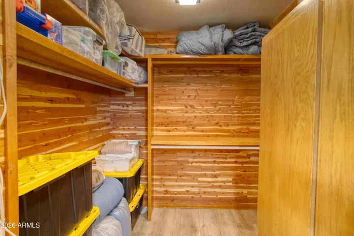 Cedar Walk-in Closet. Very Deep, L Shaped
