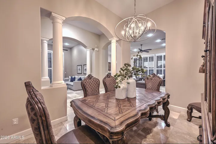 The dining room open to the family room and den.
