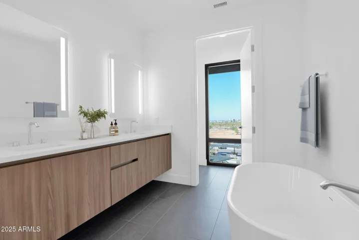 Elegant bath with soaking tub.