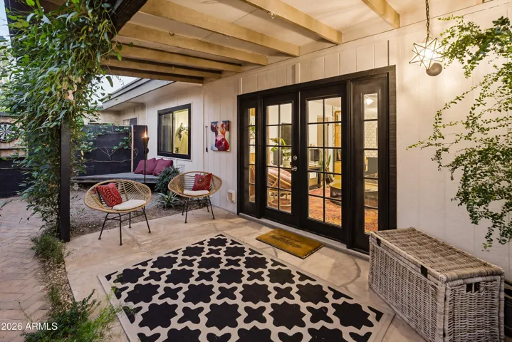 Enjoy backyard living under the covered patio. Sunrise coffee in the morning and colorful sunsets await!