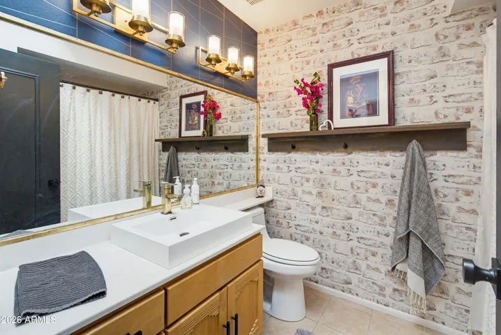 Consistent with the rest of the home, this second bathroom has all the updated fixtures and features.