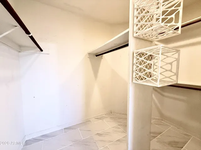 Upstairs Primary walk-in closet