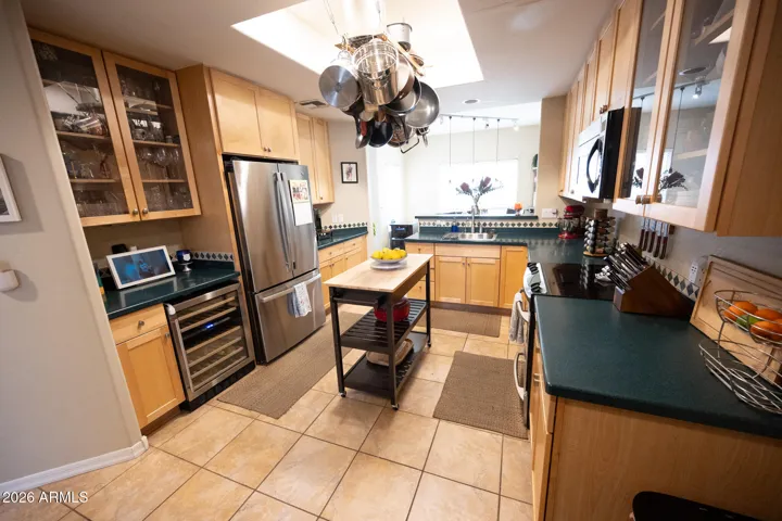 Upgraded Kitchen with new Refrigerator. wine fridge and garbage disposal.