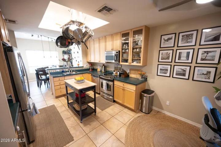 Custom Kitchen Cabinetry with under cabinet lighting.