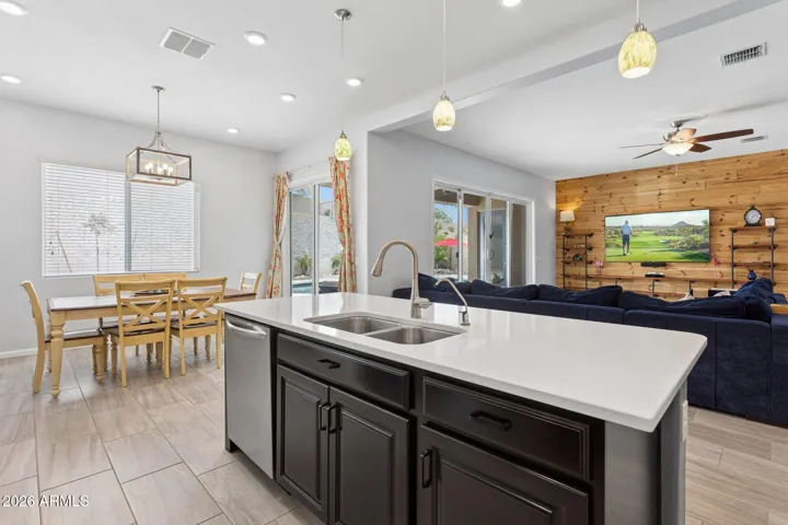 Open kitchen layout that flows seamlessly into the living and dining areas