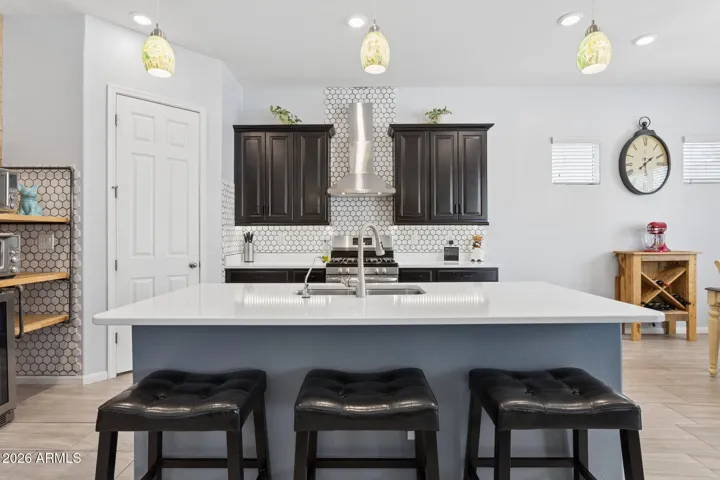 Spacious island with room for prep, seating, and gathering