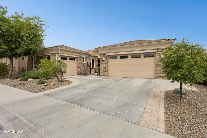 Separate 2-car + 1-car garages for added versatility