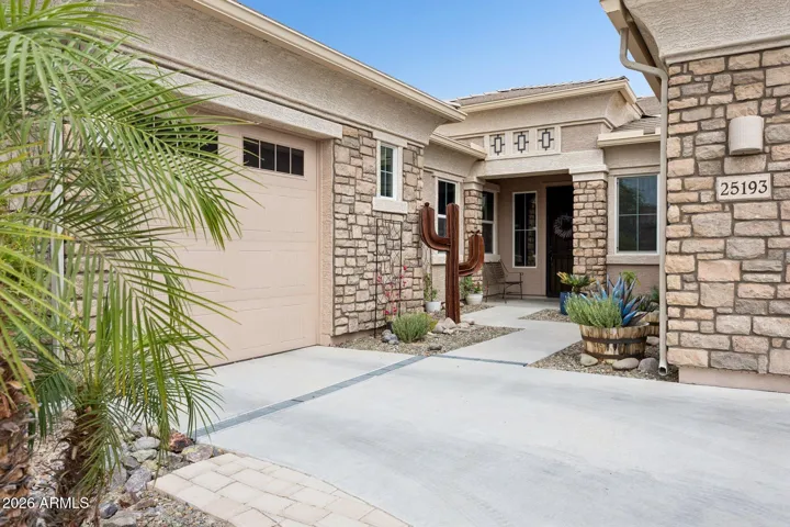 Charming covered entry with welcoming curb appeal