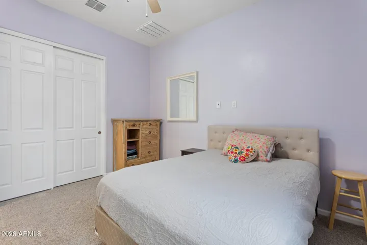 Ample sized secondary bedroom with large closet and double doors