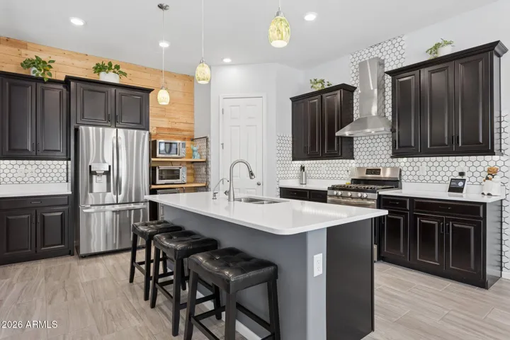 Quartz countertops and designer cabinetry