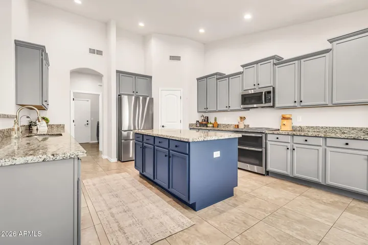 Beautiful kitchen with corner pantry and island