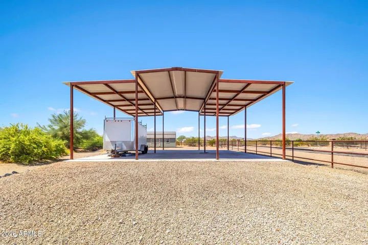 3-bay RV shade with poured concrete slab...room to store all your toys