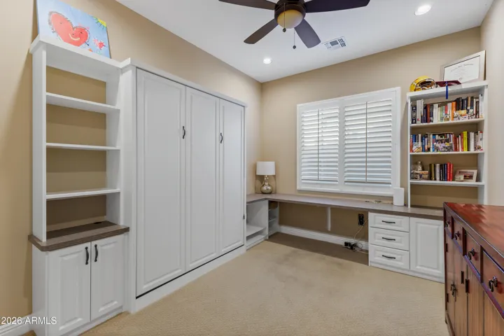 Third bedroom currently set up as an office with a Murphy bed.