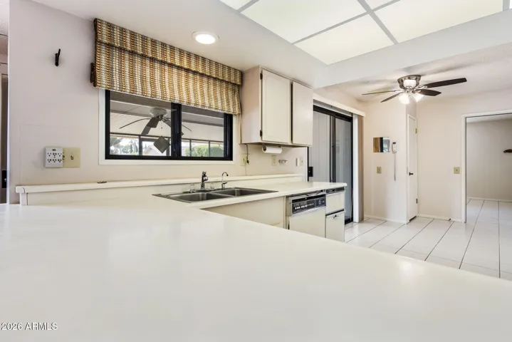 View of breakfast nook in kitchen w slider to Lanai Screened Room