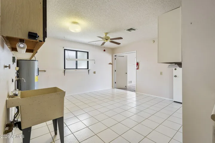 Hobby Room, Laundry Room and Golf Cart Access w/Double Door Entry from Garage