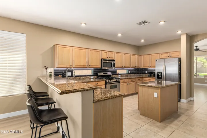 Spacious open kitchen with large breakfast bar