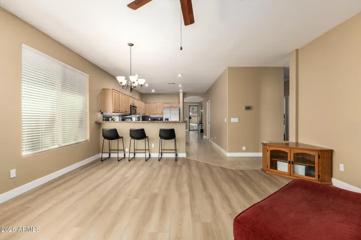New lvp in spacious family room open to kitchen.