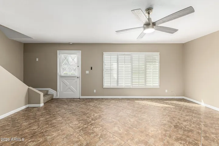 Light and Bright Unit With Wooden Shutters