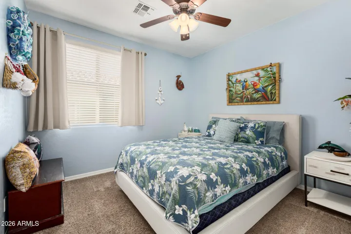 Bedroom 2 is over by the flex space and is spacious with a walk in closet.