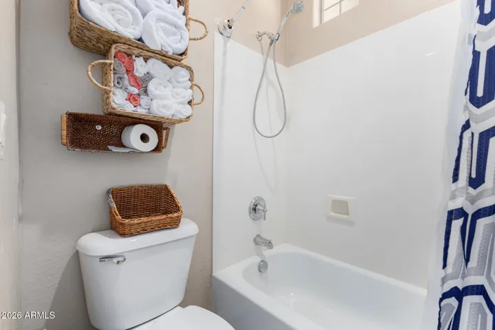 Someone can shower while someone else brushes their teeth with this great bathroom set up!
