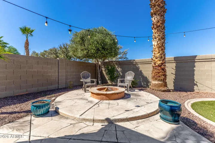 Ok ok. now we are really talking! Not only do you have a pergola, lights, hot tub, music, pool, rv gate & side yard but there is a firepit and turf!!! Smores anyone?