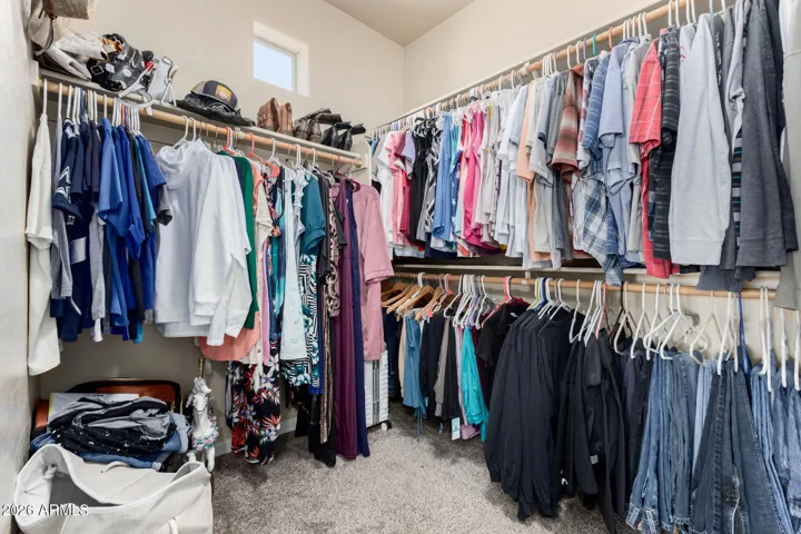 Spacious and bright walk in closet in the primary.