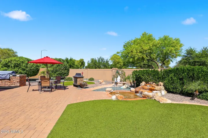 Large Brick Entertainment Areas with Water Feature