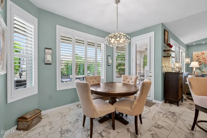 Bayed dining area opens to the patio.