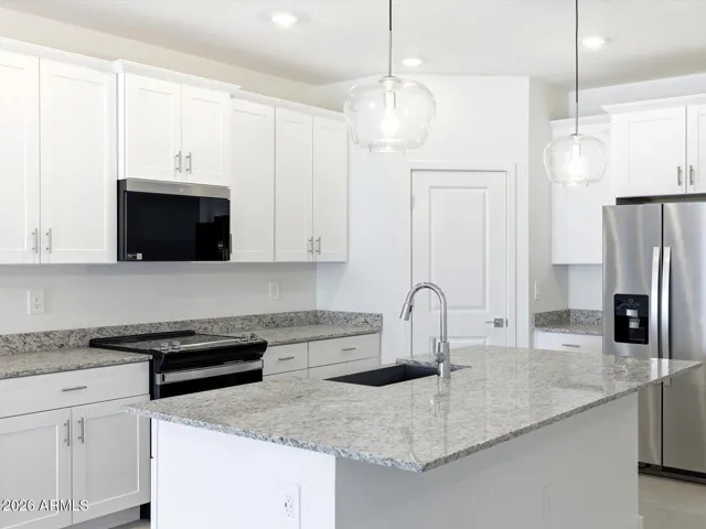 Photo is not of the actual home. Interior finishes and fixtures may vary.