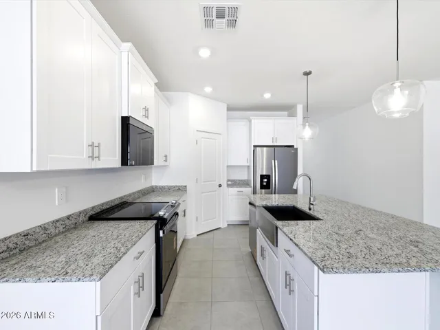 Photo is not of the actual home. Interior finishes and fixtures may vary.