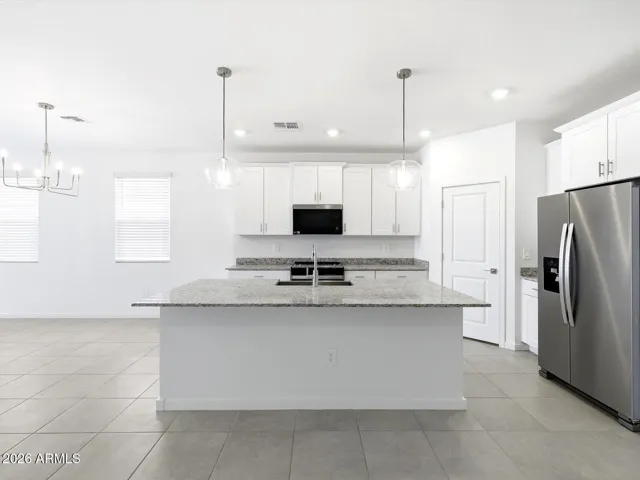 Photo is not of the actual home. Interior finishes and fixtures may vary.