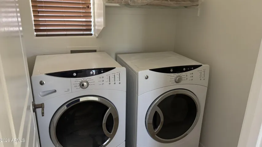 laundry room and washer and dryer