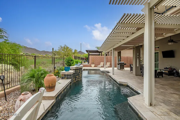Contemporary pool, extended patio and pergola