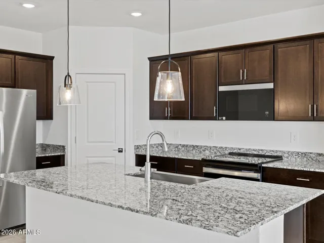 Photo is not of the actual home. Interior finishes and fixtures may vary.