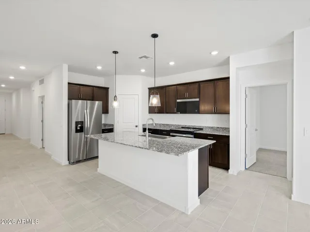 Photo is not of the actual home. Interior finishes and fixtures may vary.