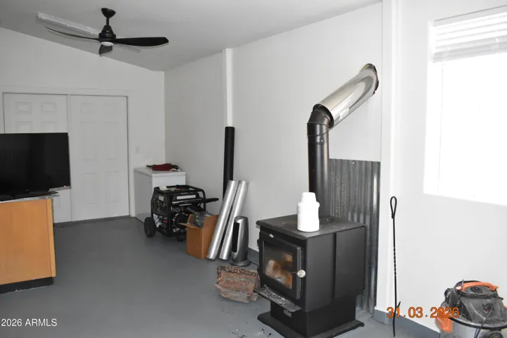 Storage/work out room off kit/laundry. wood burning stove