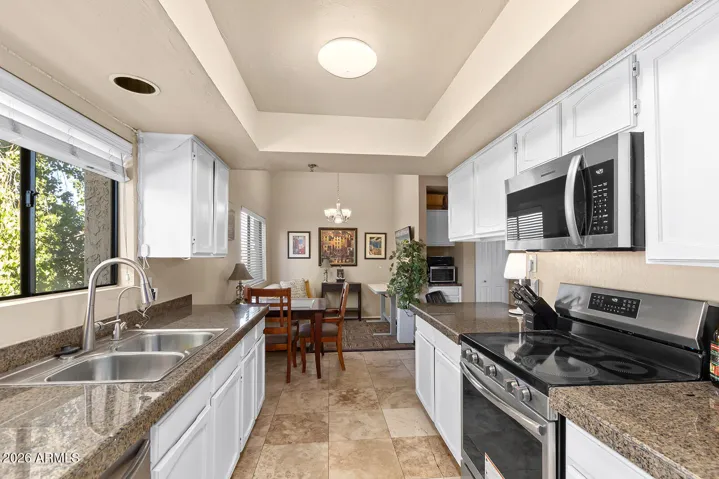 There is a great flex area here off kitchen, dining or office ...