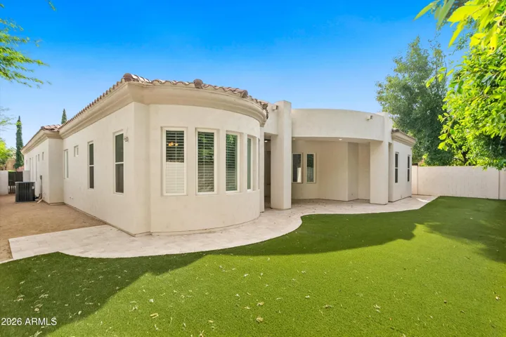 Large grass area in Private back yard. Low maintenance landscaping.