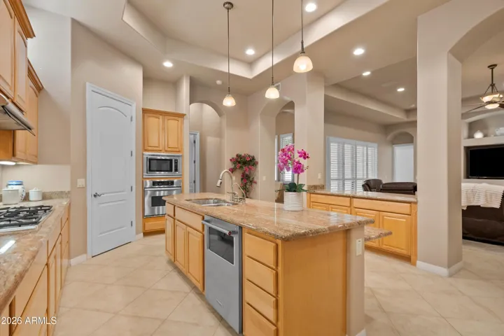 kitchen Thoughtfully designed residence offering stylish finishes. Spacious, light filled, and thoughtfully designed - this 4 bedroom, 4 bath North Phoenix home offers over 3,800 sq ft of living space.