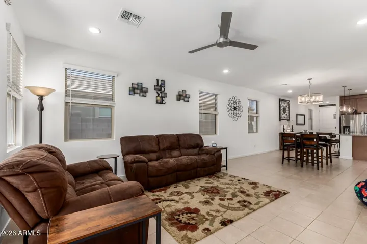 Great room large enough for the most grand size sectional and a full size dining room table.