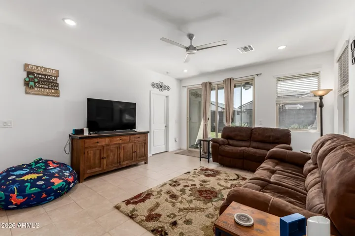 Great room large enough for the most grand size sectional and a full dining room table.